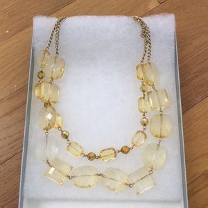 Yellow beaded necklace with gold detail